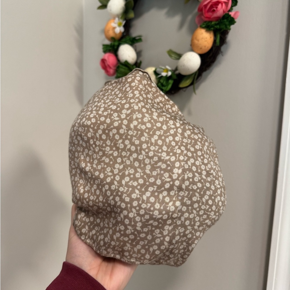 Beige Floral Sollybaby brand wrap
